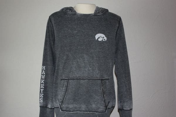A black hoodie with a white logo on the front.