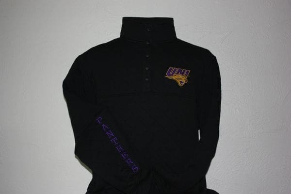 A black jacket with a purple and yellow logo.