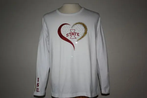 A white long sleeve shirt with a heart shaped design.