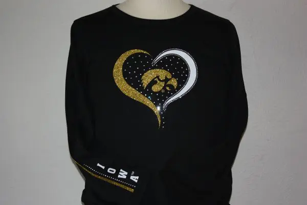 A black sweatshirt with a heart and iowa on it.