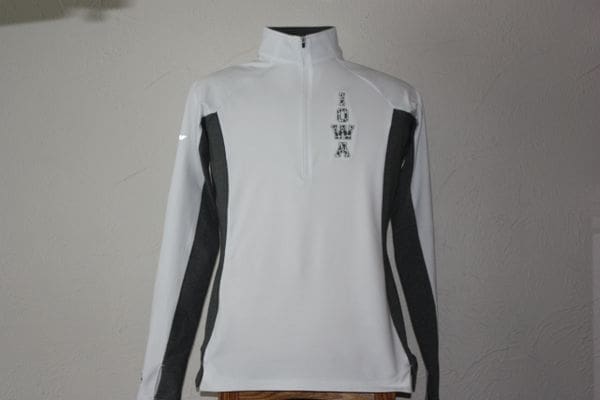 A white and black jacket with the word iowa on it.